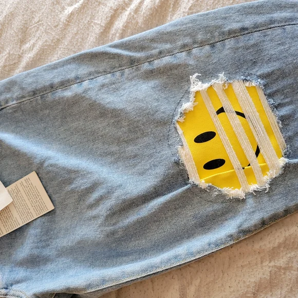 Guess X Chinatown Market Jeans with Yellow Smiley Knees
